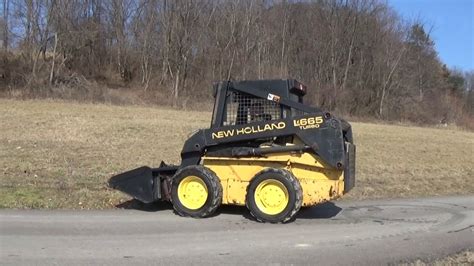 new holland skid steer 665 spec super boom|new holland lx665 price.